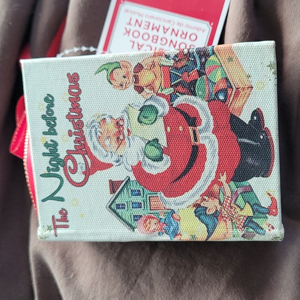 Holiday Time Musical Songbook Ornament. New. Joy to the world.